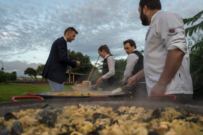 Wedding Caterers (Paella outisde a marquee) - Nova The Outsiders